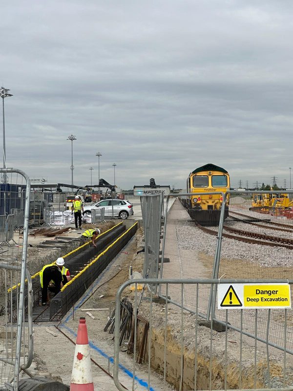 Rebar excavation alongside live rail